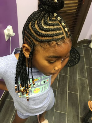  Here we have a stunning short tribal braid idea that has been finished off with beads 32 African Long Tribal Braids Ponytail Updos To Try In 2019