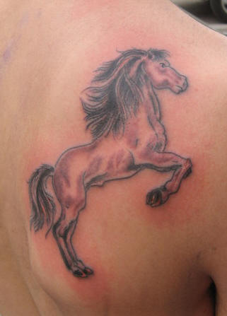 Often a horse tattoo will be a symbol of strength such as one 