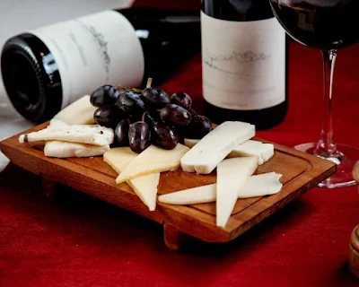 Tuscan vineyard with Chianti wine and Pecorino cheese platter