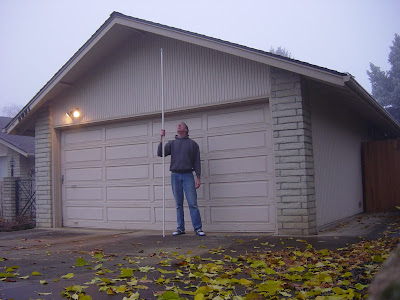 The Christmas-light-hanging pole is 10 feet long.