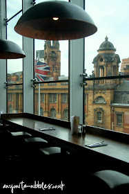 Tables overlooking London street and the abandoned fire station at Manchester Piccadilly | Anyonita-nibbles.co.uk