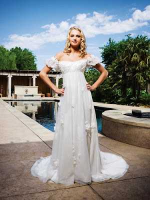 Such a sweet style made with English netting this gown features an empire 