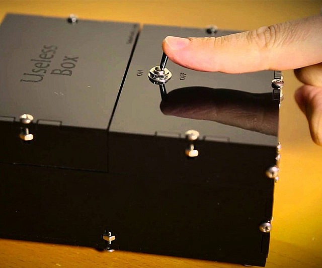 Unleash the Fun: The Useless Box - A Glimpse into Playful Absurdity!