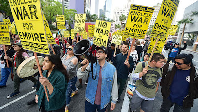 Antiwar activists and Syrians worldwide protested the joint airstrikes by allies U.K, U.S and France against Syria. The nations defend their decision to bomb the war-torn nation - reprisal for the chemical attack on Syrians allegedly by their President, Bashar al-Assad.