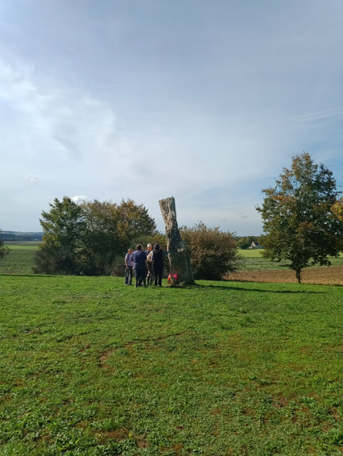 Studying lichens on a dolmen, Indre et Loire, France. Photo by Loire Valley Time Travel.