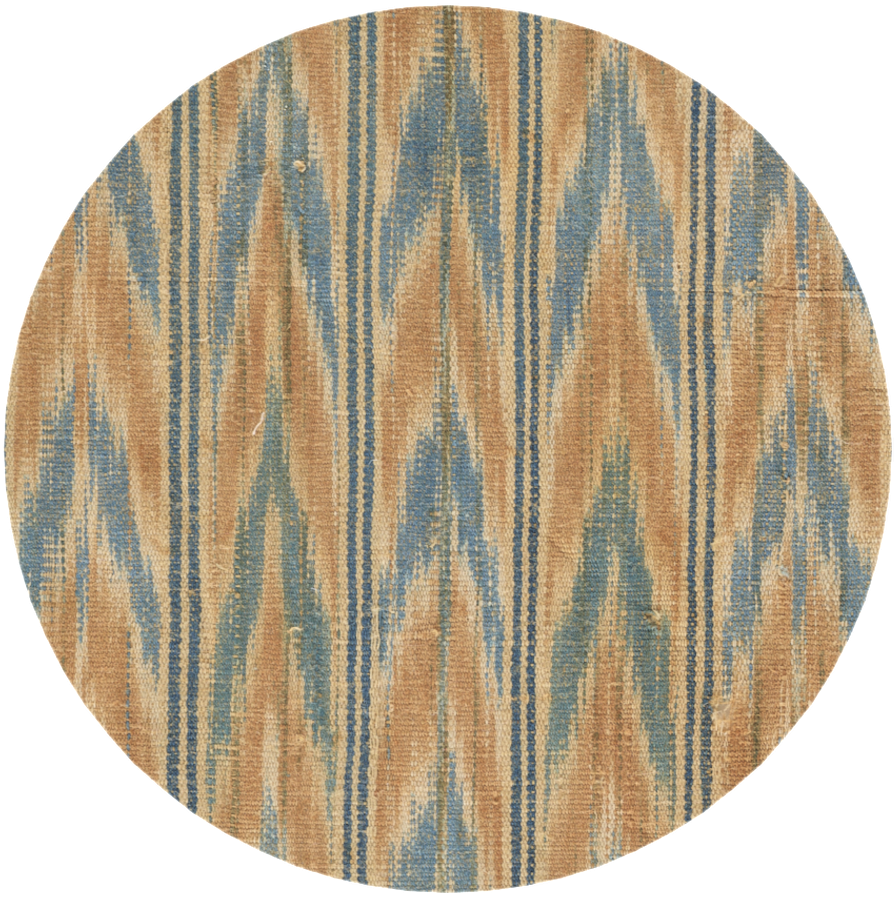 A patterned weaving with vertical columns of nested V shapes, in alternating blue and reddish-brown against an ivory background