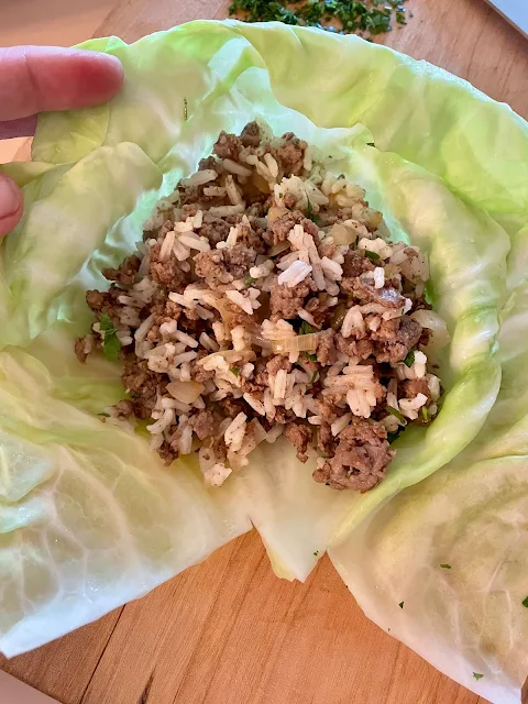 Filling in a cabbage leaf.