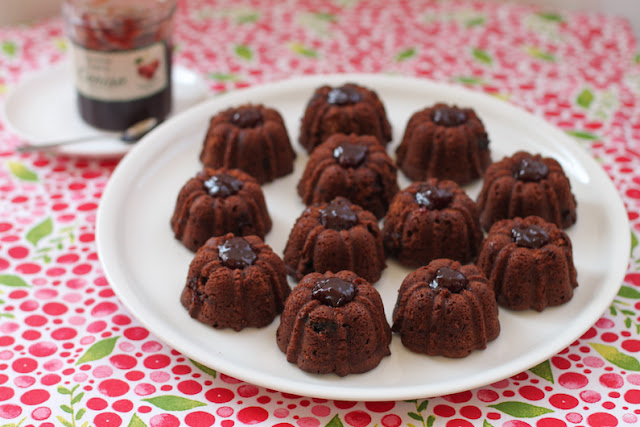 Food Lust People Love: These chewy cherry brownie bundtlets are as delicious as they are pretty, with a rich brown crumb, ribbons of cherry jam inside and little dollops of cherry jam on top. Best of all, they are super easy to make.