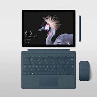 Source: Microsoft. The Surface Pro (top left) together with accessories.