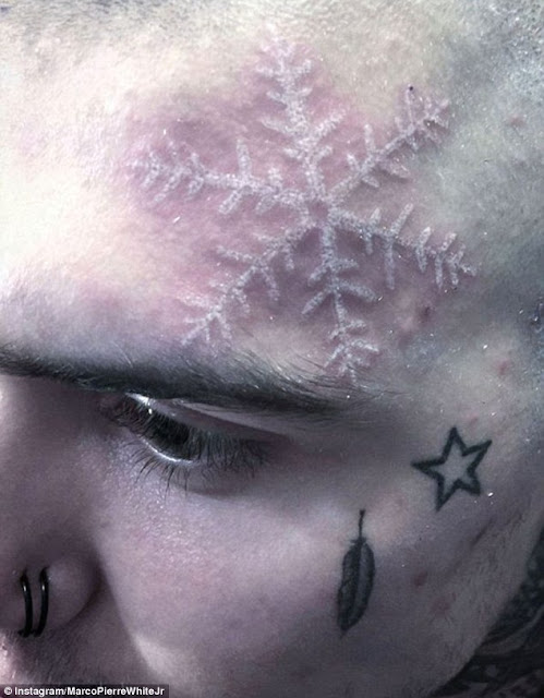 New Latest Snowflake Tattoo on Marco-Pierre White Jr Forehead