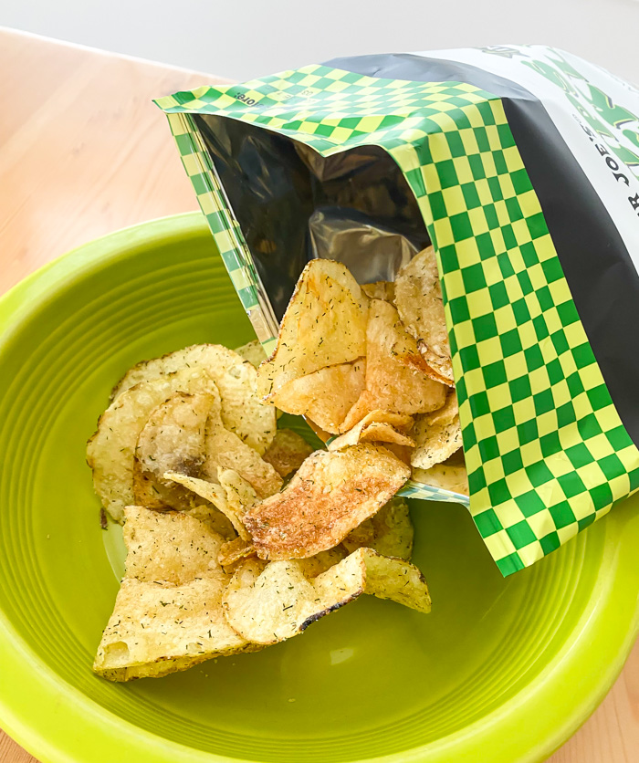 Trader Joe's Dill Pickle Potato Chips poured in bowl