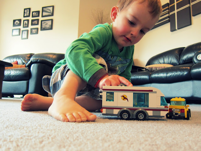 Engrossed in play with the LEGO City Car & Caravan