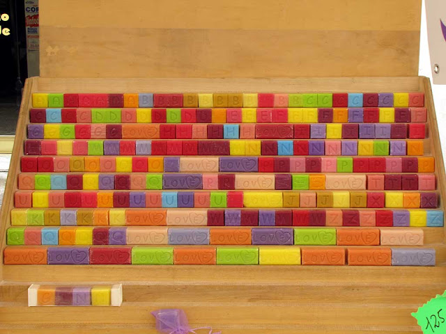 Colorful soap cubes with alphabet letters, via Guglielmo Oberdan, Pisa