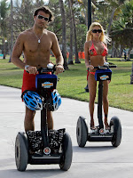 Shauna Sand And Her Airbags On A Segway 