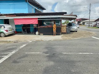 " The best deep fried doughnut balls in Suriname"