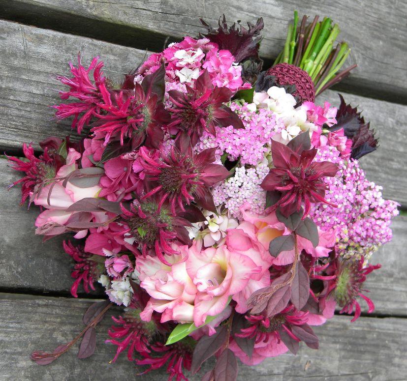 For a one of a kind summer wedding bouquet I suggest going with flowers 