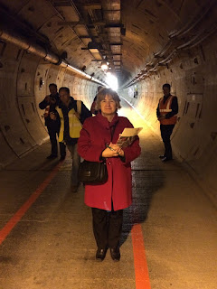 Pic of Karen Andrews standing in service tunnel of the Channel Tunnel