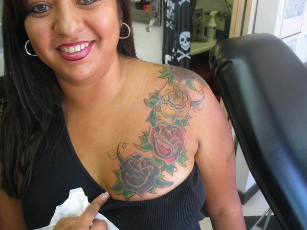 Labels Flower Tattoo On Breast