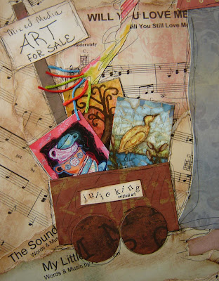 the little brown cart holds some of my favorite mixed media torn paper 