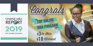 A woman wearing a pair of reading glasses congratulating top 10 online MBAs of 2019.