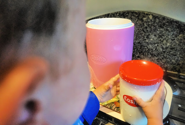 toddler using the easiyo yoghurt maker