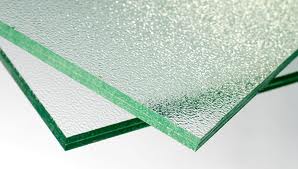Laminated glass with different textures