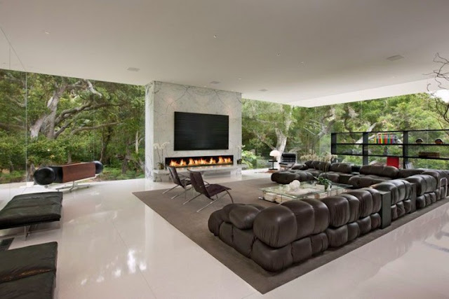 Photo of modern minimalist living room with glass walls