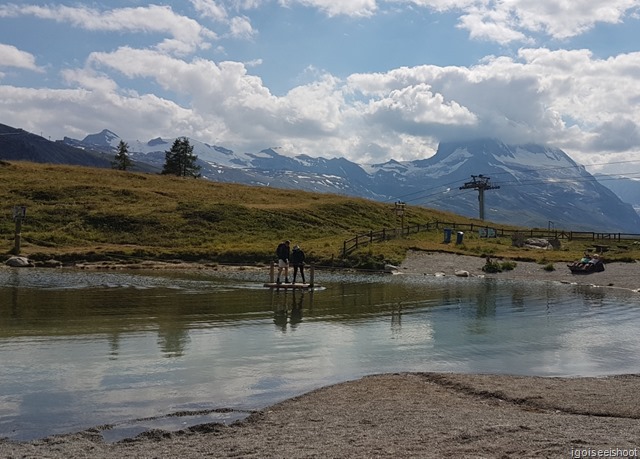 Playing with the raft at Leisee, with views of the alpine landscape and Matterhorn.