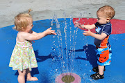 . touching the water and looking in your direction. Are you happy now? (waterpark )