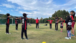 One girl, next to Bijeyata in a boys training session, August 2022.