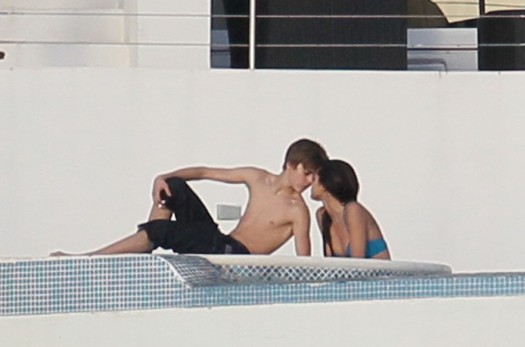 justin bieber and selena gomez kissing on yacht. those words are from Justin
