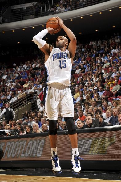 vince carter dunks on 7 footer. a Vince Carter 18 footer.