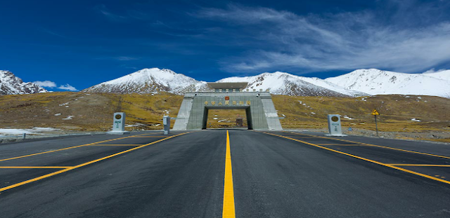 The Khunjerab Pass borders Pakistan to which country?