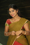 Midhuna latest sizzling pics in half saree-thumbnail-18