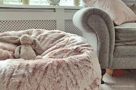 Dusky blush rose pink and grey lounge sitting room with faux g=fur beanbag