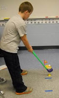 I found a child's golf set at the local dollar store, and decided it would be great for a math game! Here's how it worked!