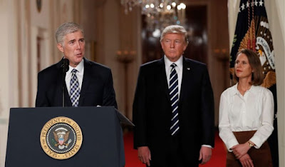 Supreme Court (left) Justice Neil M. Gorsuch and President Donald Trump