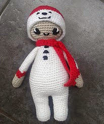 http://www.ravelry.com/patterns/library/noo-noo-doll-in-her-snowman-costume