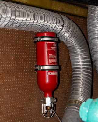 Photo of one of the automatic extinguishers in the engine room