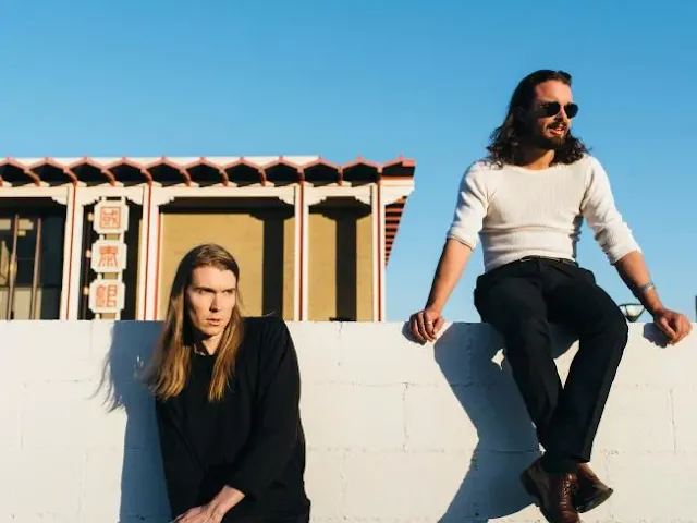 Alex Cameron and Roy Molloy.