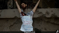 https://ann.az/en/isis-thugs-behead-blindfolded-man-and-crucify-his-corpse-/