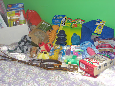 Picture of all the dog items I have - from dog toys to a matching leash & collar