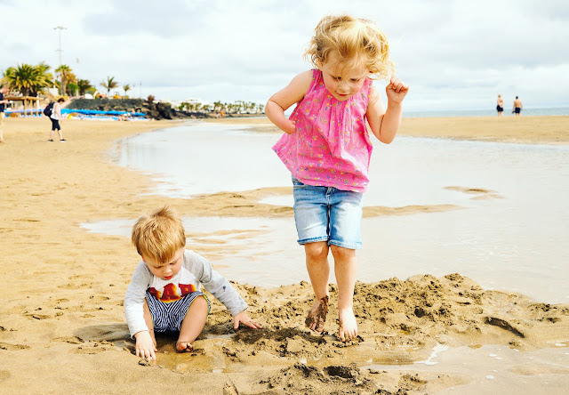 Tropical Island Playa Blanca Review, kids playing in the sand