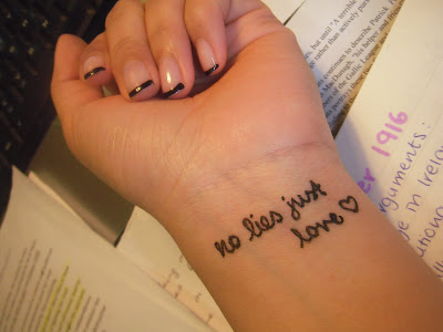 and this is the tattoo that she got cept in super ugly handwritten font