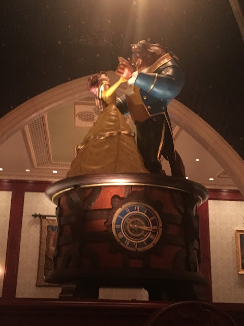 Bell and Beast Dancing Statue Be Our Guest Restaurant Magic Kingdom Walt Disney World