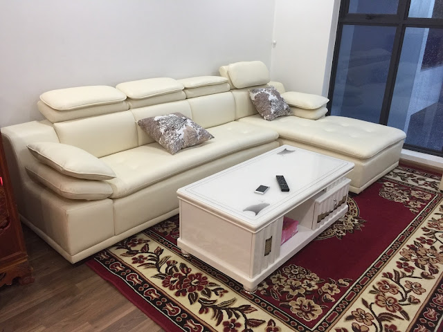 Hình ảnh bộ ghế sofa da góc chữ L màu trắng đẹp hiện đại và sang trọng phân phối bởi Nội thất AmiA