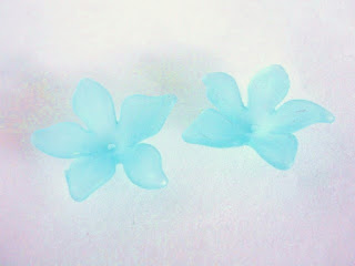 http://www.beads2string.com/collections/flower-leaf-acrylic/products/frosted-blue-flower-beads-29mm-clematis-acrylic