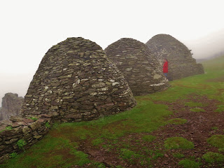 Mysterious Beehive shaped huts on the Island of Skellig Michael, Kerry Coast, Ireland