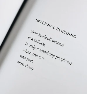 A page with these words written on it: Internal Bleeding - time heals all wounds is a fallacy, is only something people say when the cut was just skin-deep.