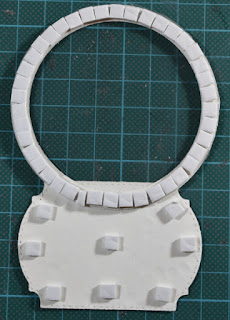 Use foam pads to create a sealed area to hold sequins for shaker card